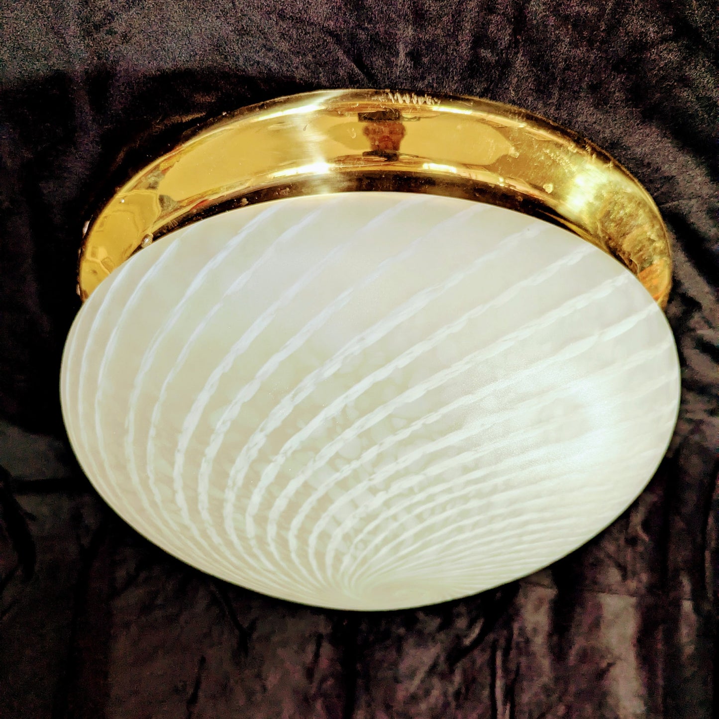An Italian white Murano glass  Domed Ceiling Light  With Brass Gallery on a black bacgkround