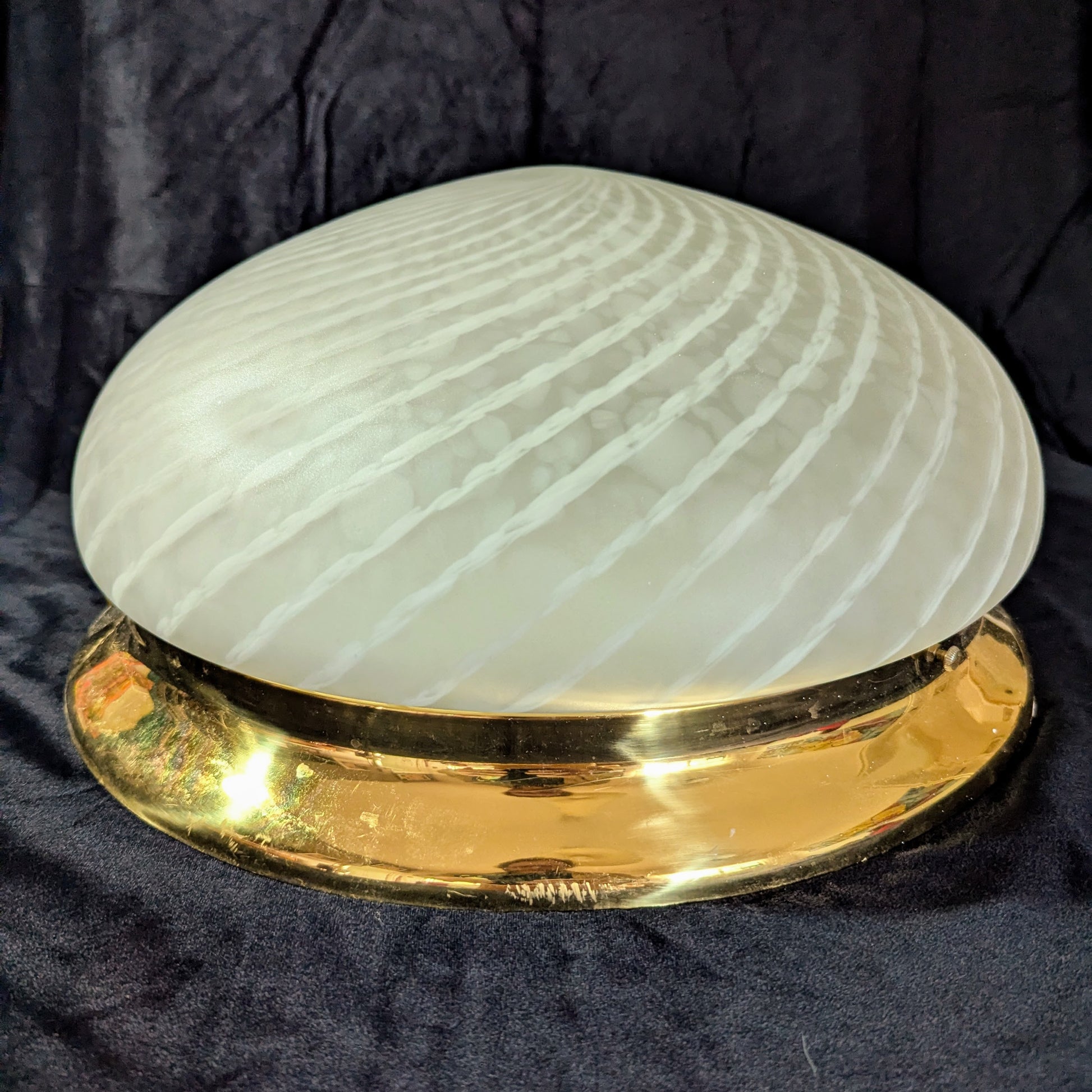An Italian white Murano glass  Domed Ceiling Light  With Brass Gallery on a black bacgkround