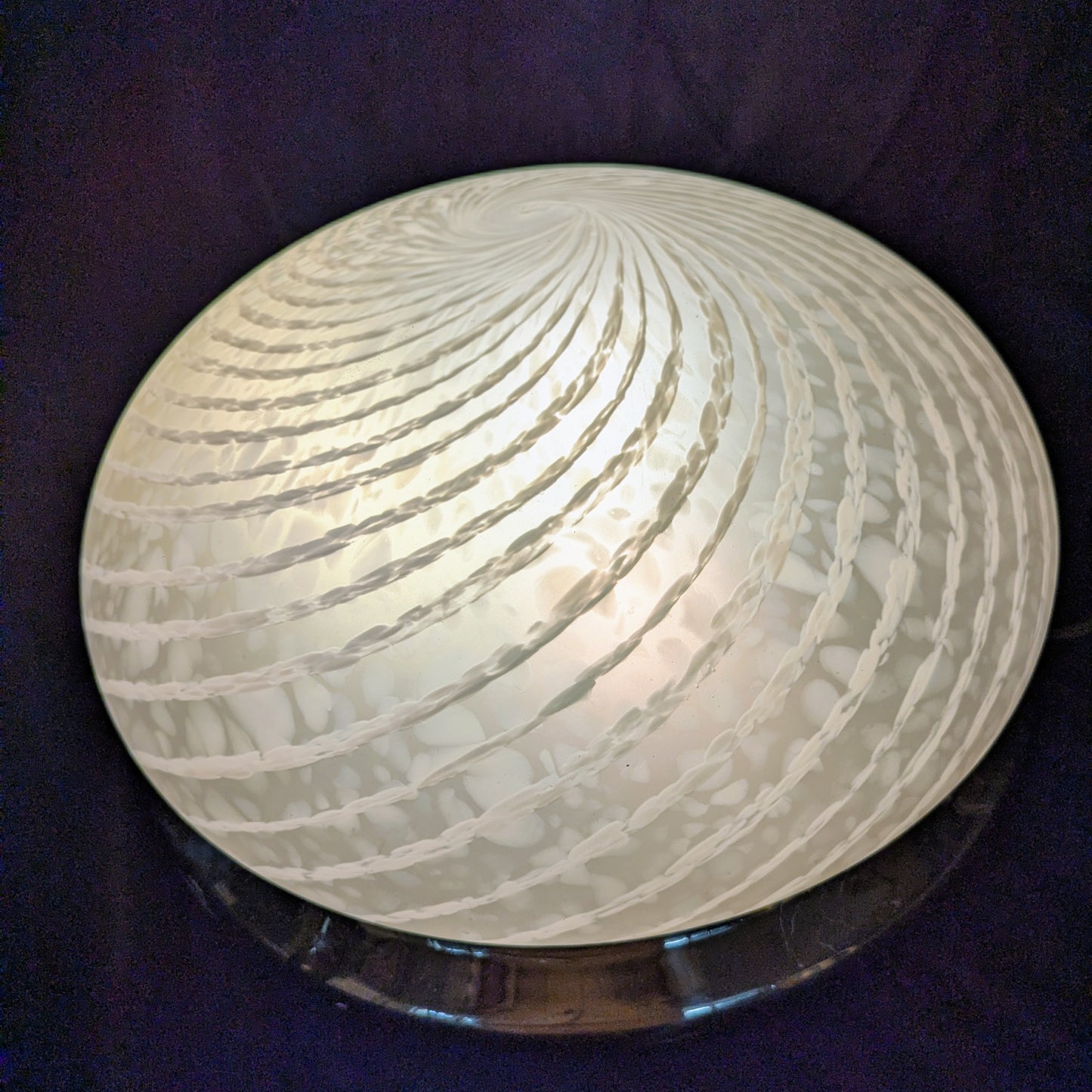 An Italian white Murano glass  Domed Ceiling Light  With Brass Gallery on a black bacgkround