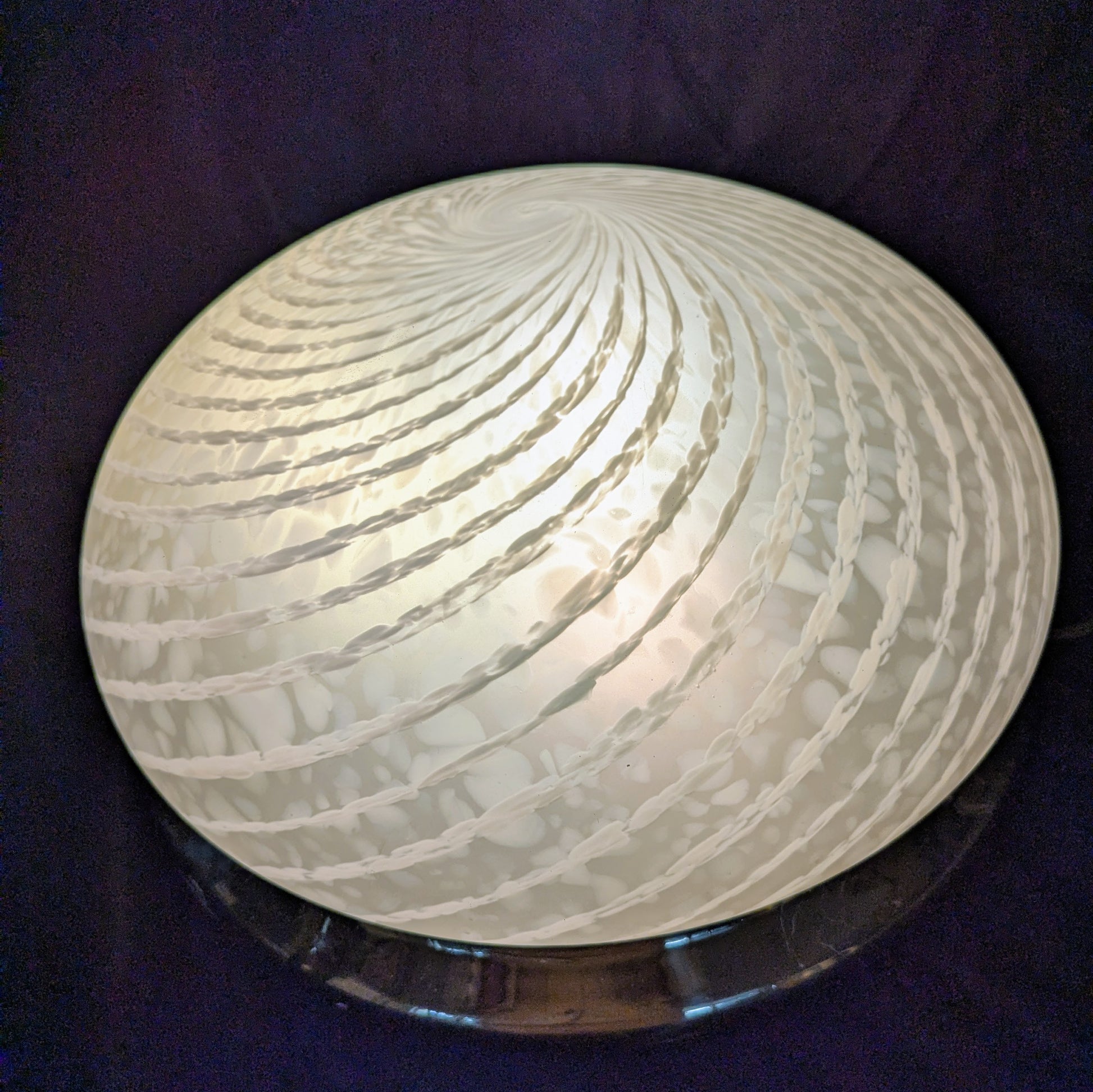 An Italian white Murano glass  Domed Ceiling Light  With Brass Gallery on a black bacgkround