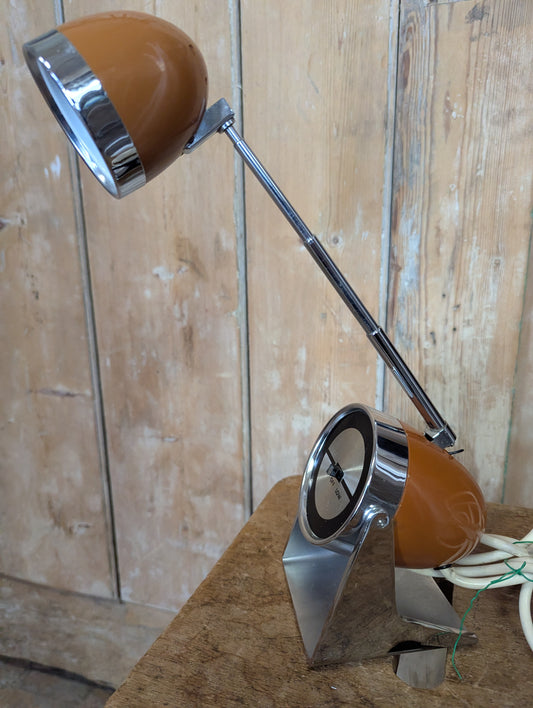a brown Hamilton Industries Model 60 1957 Desk Lamp on a wooden background